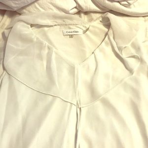 Calvin Klein white top.